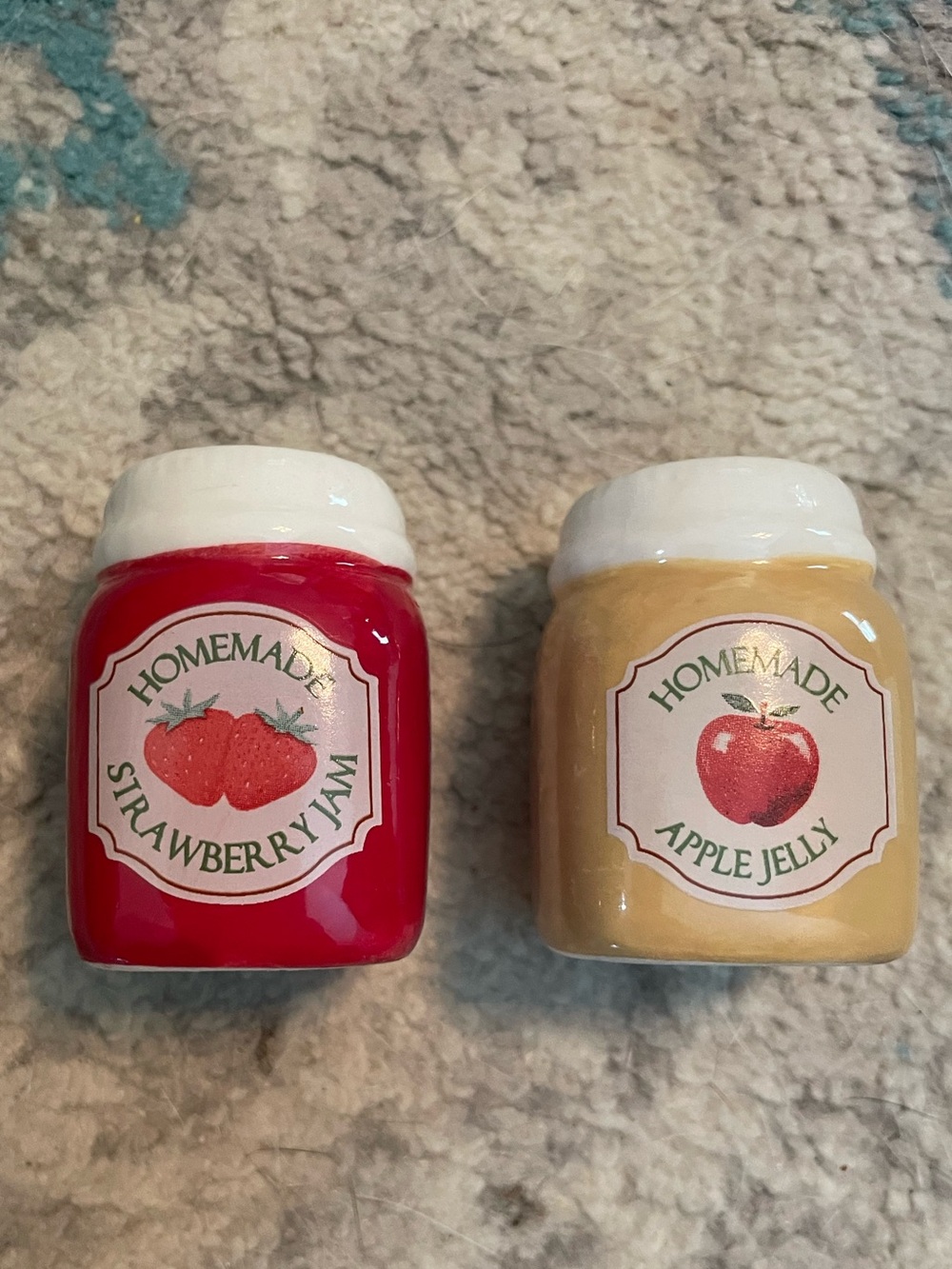 Retired strawberry jam and apple jelly salt and pepper shakers set